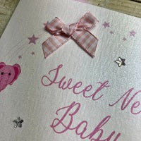 Sweet New Baby - Pink Toys in a circle